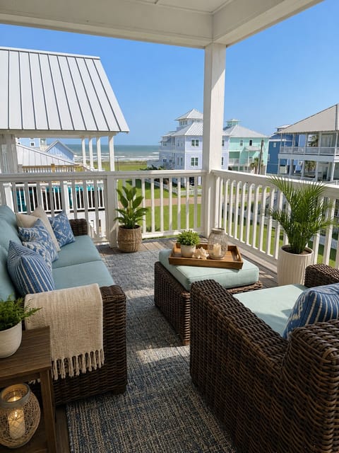 Enjoy some ocean breeze on the upstairs covered porch 
