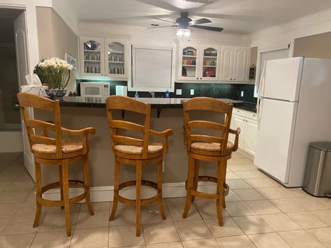 Bar seating in kitchen.