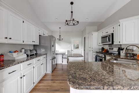 Gas stove, microwave, toaster oven, toaster, small island, and keurig available