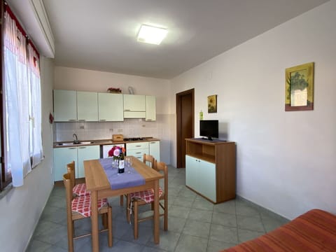 Property, Table, Furniture, Picture Frame, Wood, Interior Design, Floor, Flooring, Curtain, Houseplant