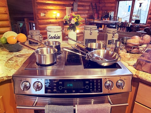 Kitchen stove and items that can be used for cooking. 
