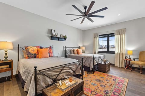 Settle in together with twin beds and warm, cheerful decor.