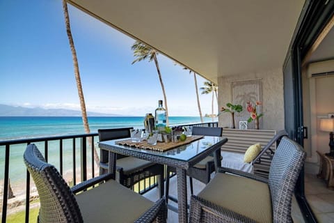 Dine al fresco on a balcony with sweeping ocean views.