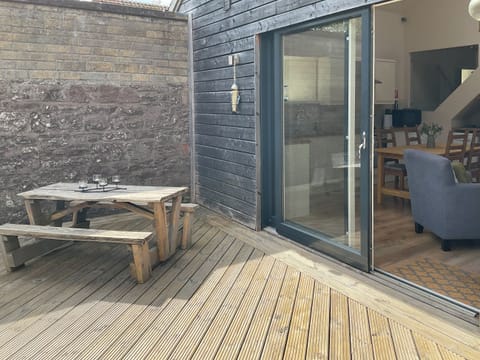 Patio area with sliding door to living area | Birch Tree Cottage, Edzell, near Brechin