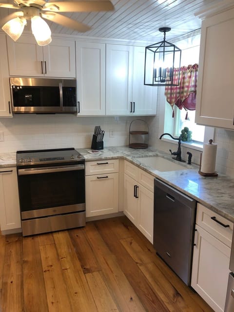 Updated kitchen with quartz counters and new appliances 