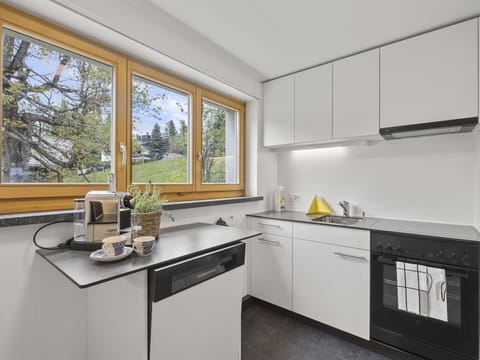 Countertop, Cabinetry, Property, Window, Kitchen, Building, Sink, Interior Design, Kitchen Stove, Tap