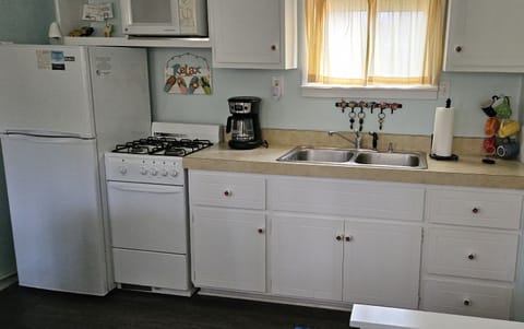 Kitchen - Cooking basics, dishware & flatware, refrigerator, oven, stove, microwave, toaster, drip coffee maker, trash bags, paper towels.