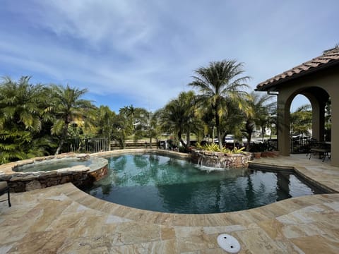Stunning views overlooking the back court yard pool deck.