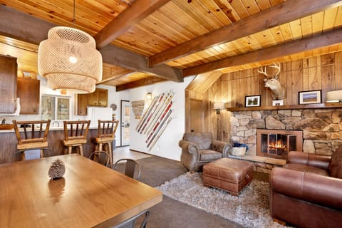 View of dining table and kitchen on first level when you enter.