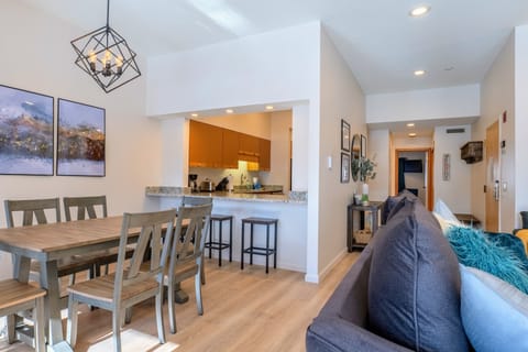 Dining room with a breakfast bar and hallway