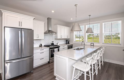 quartz counters and stainless appliances