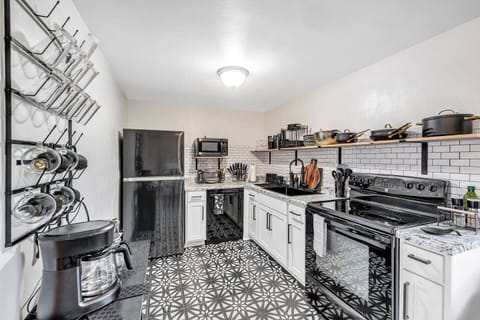 Fully equipped kitchen with all brand new stylish dinnerware. Includes crockpot, toaster and oven with convection bake for quick pizzas