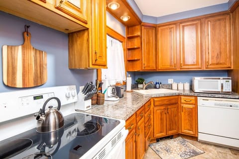 Cute Kitchen with lots of cabinet space 
Laundry/mud room is located on the left