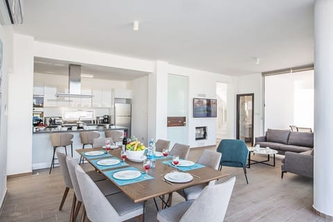 Dining Area with table and chairs to seat 8 people