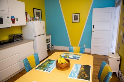 Our updated, modern communal kitchen, complete with microwave, induction burner cooktops, toaster oven and coffee maker.