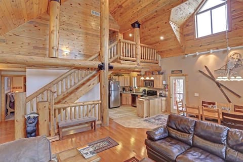 Log staircase and spacious main floor.