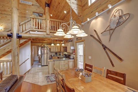 Log staircase and spacious main floor.