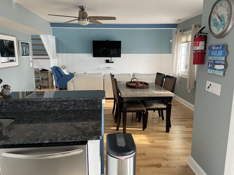 View of Kitchen Island, Dining Room, Living Room