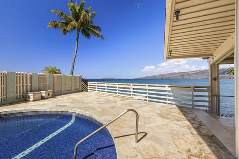 Relax in the private pool while enjoying unobstructed views of Maunalua Bay with Diamond Head in the distance.
