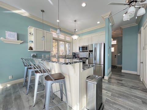 Upscale kitchen with breakfast bar