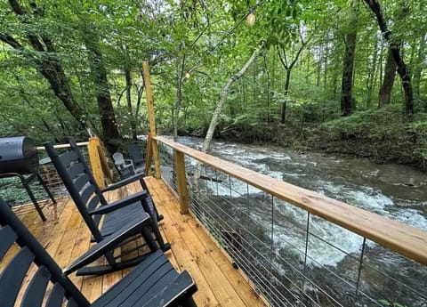 Peaceful balcony overlooking the creek—ideal for quiet relaxation.
