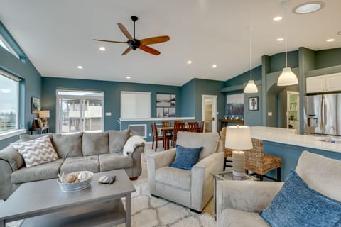 Open plan living/dining space with ample natural light