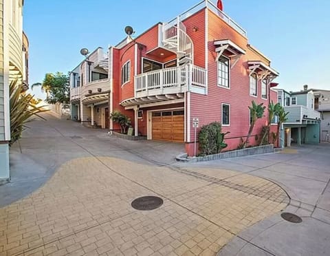 One of the few corner units in the private, gated complex, this town-house style unit has it all.