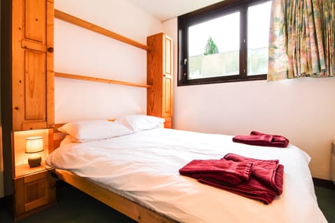 Master bedroom with linen and towels