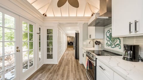 The kitchen opens up to the gardens...