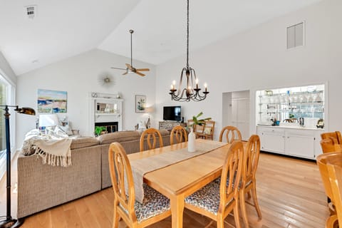 The dining room is adjacent to the living area and has a bar - perfect cocktail spot!!