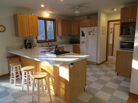 Open full kitchen with breakfast bar