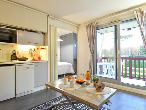 Furniture, Property, Table, Cabinetry, Building, Countertop, Plant, Wood, Living Room, Kitchen