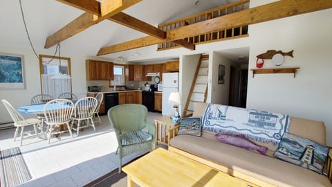 Living area with kitchen and dining area beyond