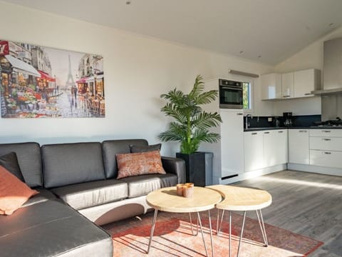 Property, Furniture, Cabinetry, Couch, Plant, Picture Frame, Table, Flowerpot, Interior Design, Houseplant