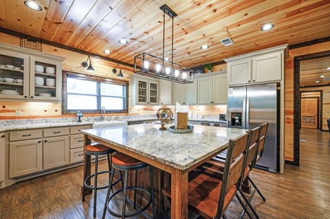 The kitchen comes with an oversized island that seats an additional 7.