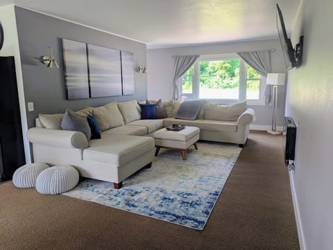 Living room - great for a movie night! (Roku TV) Couch has a pull out bed.