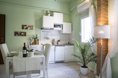 Dining table and kitchenette.
