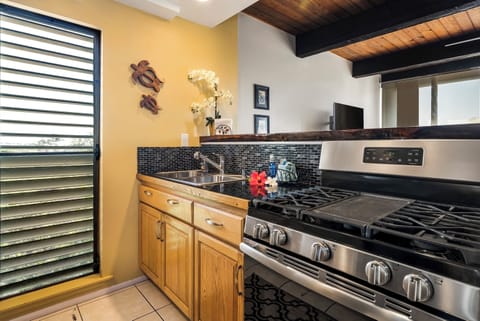 Gas range and counter space for easy home cooking.