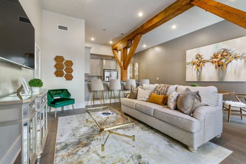 Open concept living, kitchen, dining area with lots of comfortable seating for you and your guests. 65” Samsung Smart 4K TV for streaming from apps, along with the DIRECTV Entertainment. Dining table with seating for four. All the natural light too!