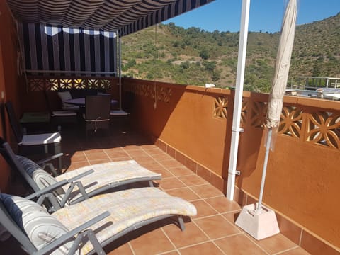 Private terrace with mountain views; sunbeds; BBQ available; 