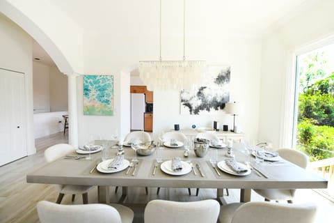 Elegant dining for family gatherings flowing effortlessly to the gourmet kitchen