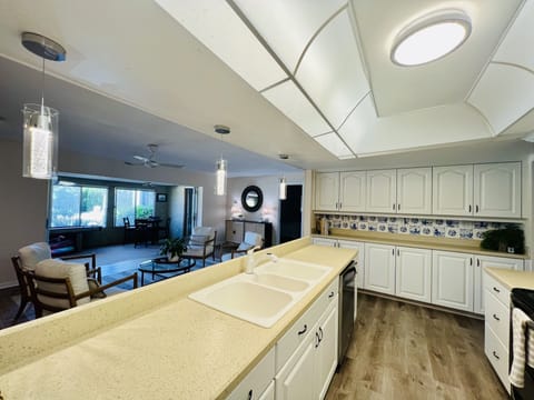 Open kitchen area that looks out to the pool 