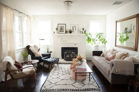 Gorgeous light filled living room. 2 chairs have been replaced with couch