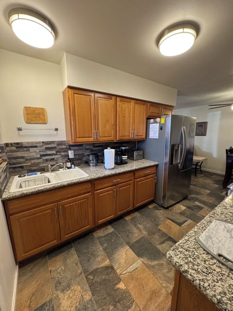 Kitchen with LG Appliances and Granite Countertops