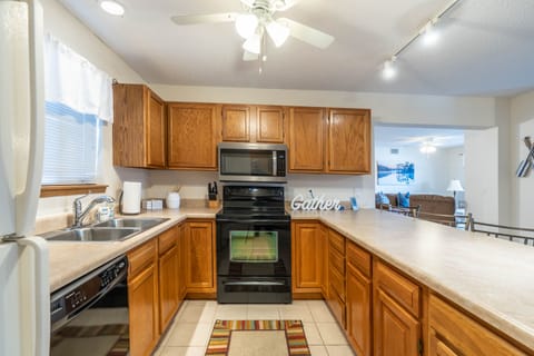 Full kitchen with all essential appliances and utensils.