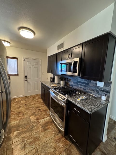 Kitchen with LG Appliances and Granite Countertops