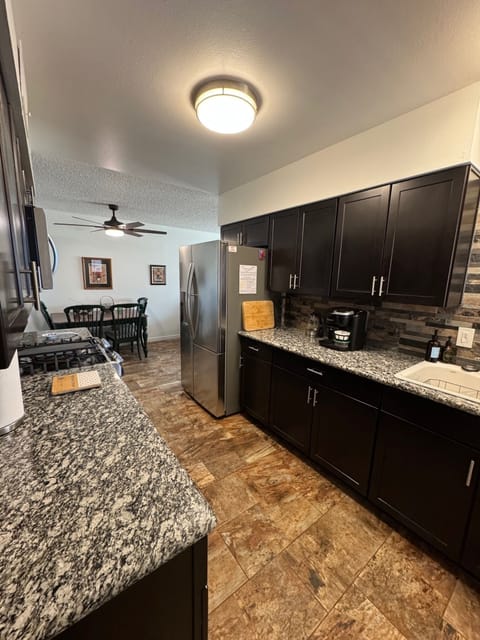 Kitchen with LG Appliances and Granite Countertops
