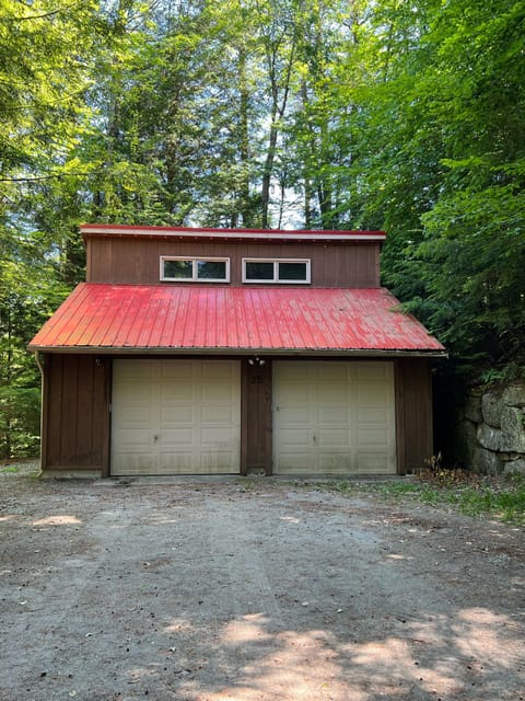 Garage at end of the road as you arrive at the house.