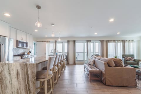 Gorgeous kitchen w Spectacular views of bay.  Sliders go out to ex-large balcony