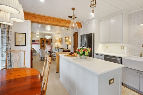 Relish breakfast, lunch or dinner in the cozy kitchen open to the living room.